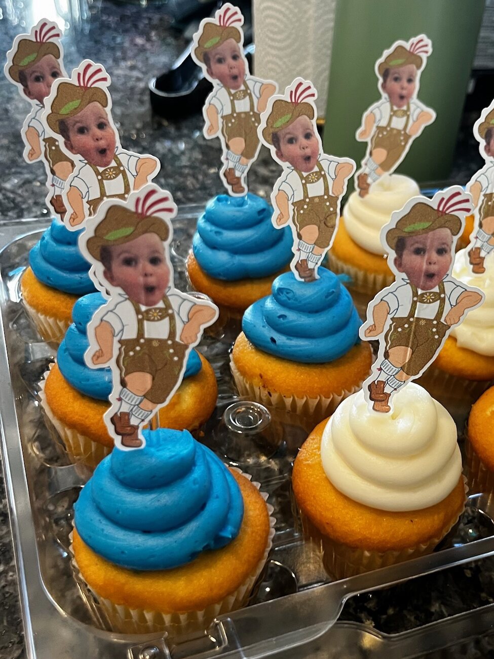 Oktoberfest birthday cupcake toppers of a toddler in lederhosen