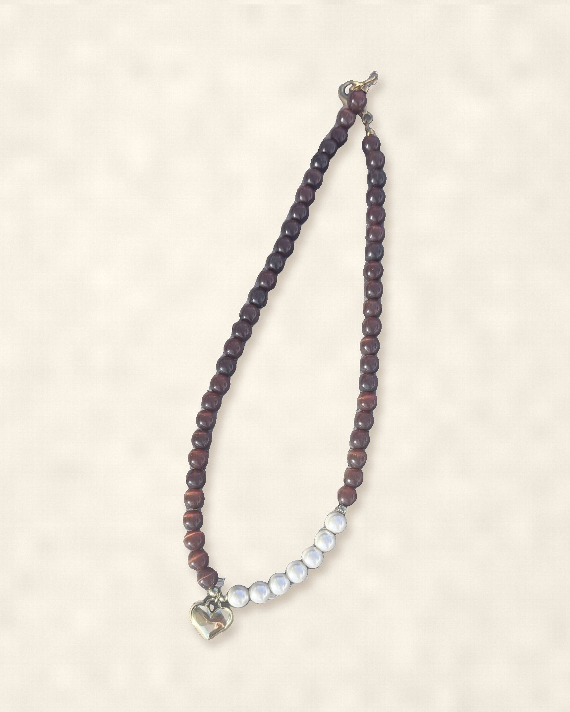 Tiger’s eye and pearl necklace with a puffed gold heart